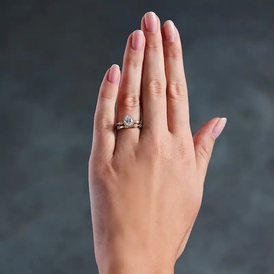 Previously Owned - Modern Reflection 1 CT. T.w. Oval Lab-Grown Diamond Frame Engagement Ring in 14K Gold (F/Vs2)