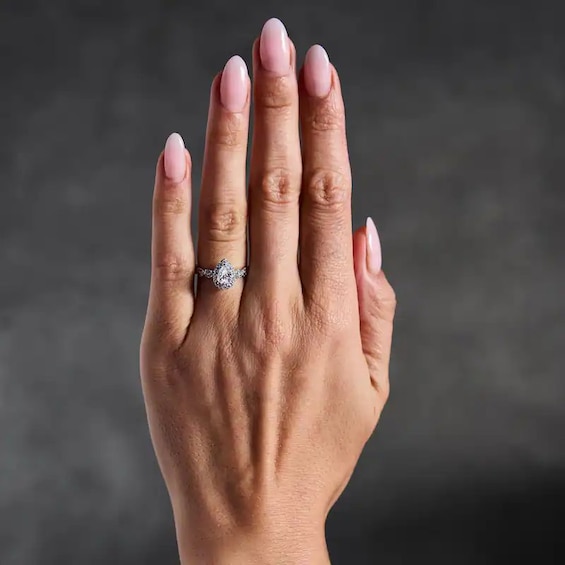 Previously Owned - 1 CT. T.w. Pear-Shaped Lab-Grown Diamond Frame Engagement Ring in 14K White Gold (F/Vs2)
