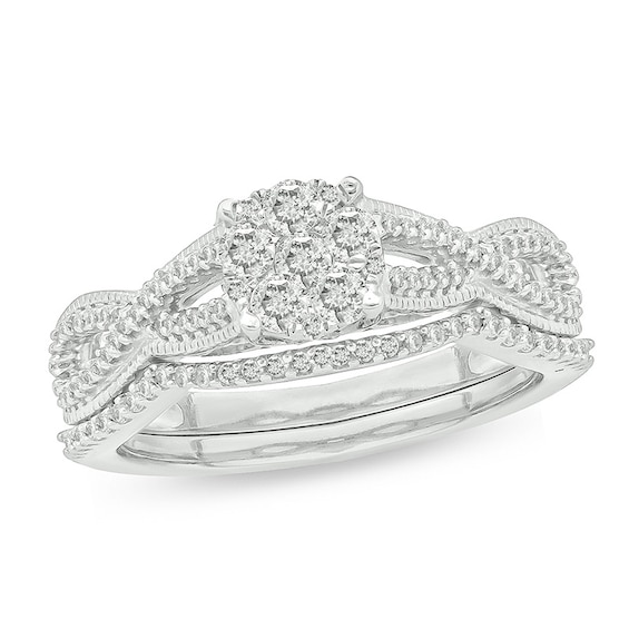Previously Owned - 1/3 CT. T.w. Composite Diamond Twist Vintage-Inspired Bridal Set in Sterling Silver