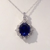 Oval Lab-Created Blue Sapphire and 1/6 CT. T.W. Diamond Vintage-Style ...
