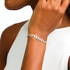 Thumbnail Image 5 of Made in Italy 6.0mm Diamond-Cut Curb Chain Bracelet in Hollow 10K Two-Tone Gold - 8.5"