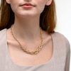 Thumbnail Image 4 of Graduated Curb Chain Necklace in Hollow 10K Gold - 18"