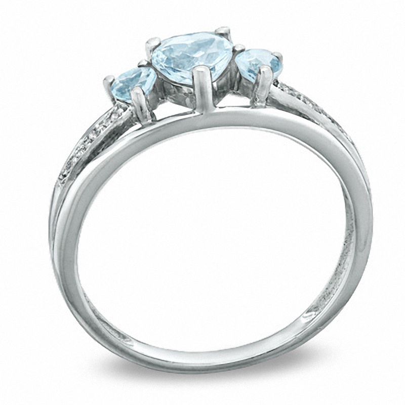 Heart-Shaped Simulated Aquamarine Three Stone and Diamond Accent Ring in Sterling Silver