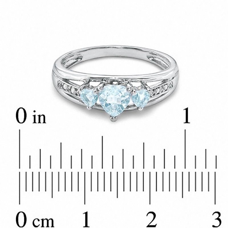 Heart-Shaped Simulated Aquamarine Three Stone and Diamond Accent Ring in Sterling Silver