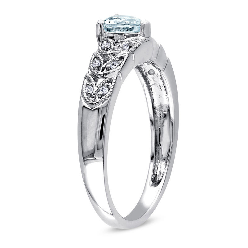 Heart-Shaped Aquamarine and 1/20 CT. T.W. Diamond Leaf-Shank Promise Ring in Sterling Silver
