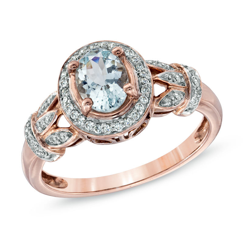 Oval Aquamarine and 1/6 CT. T.W. Diamond Frame Vine Ring in 10K Rose Gold