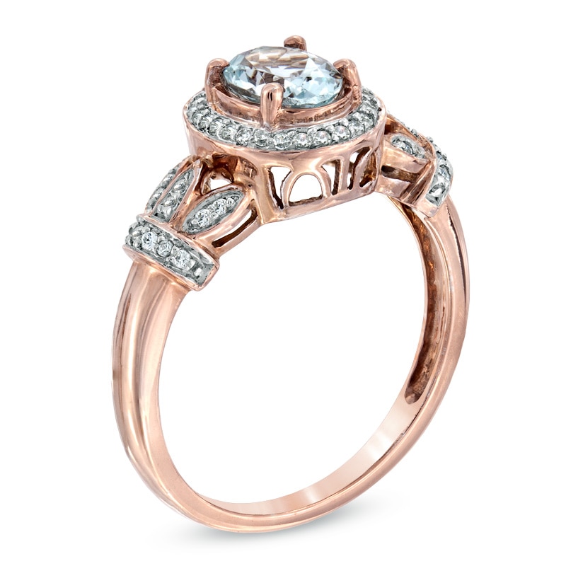 Oval Aquamarine and 1/6 CT. T.W. Diamond Frame Vine Ring in 10K Rose Gold