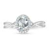 Thumbnail Image 3 of Oval Aquamarine and 1/15 CT. T.W. Diamond Frame Twist Shank Ring in 10K White Gold